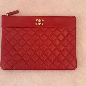CHANEL Red Quilted Clutch with Gold Logo